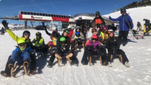 groepsfoto op slee Vige Astfeld